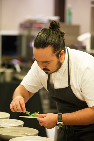 Adam Liaw wearing MUJI Apron