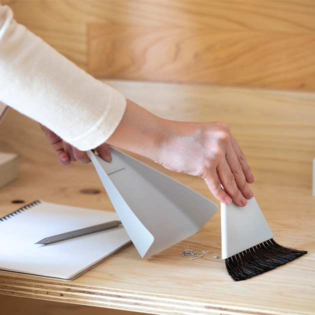 Sweeping desks and tabletops