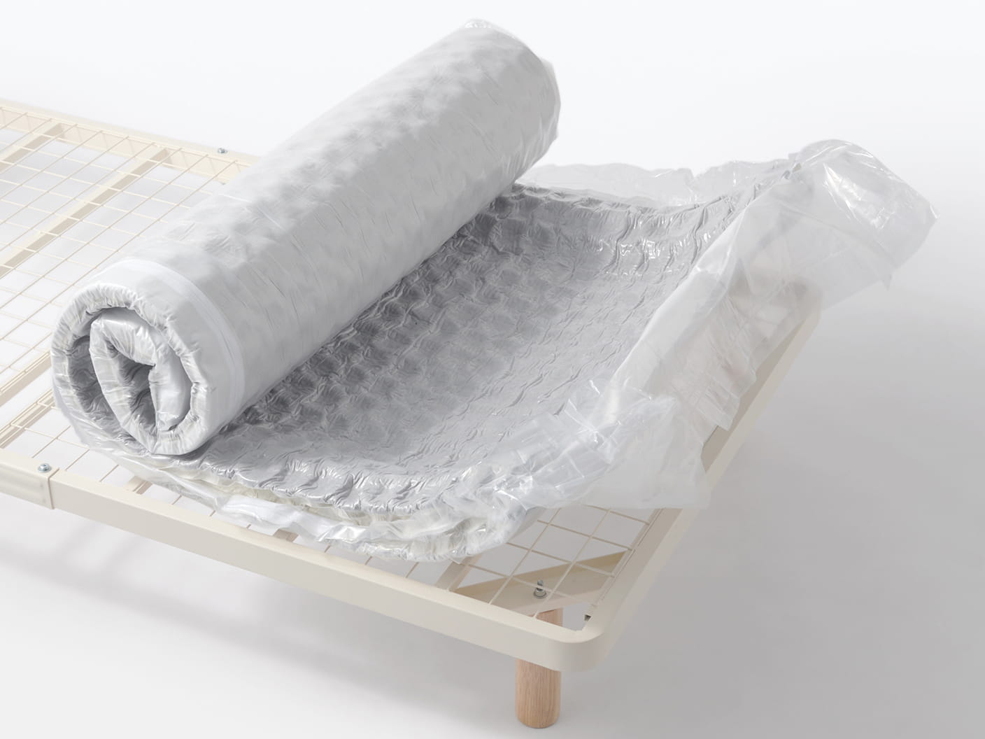 圧縮された状態の脚付マットレスの様子