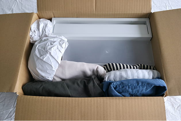 段ボールに回収希望品で隙間がないように梱包する