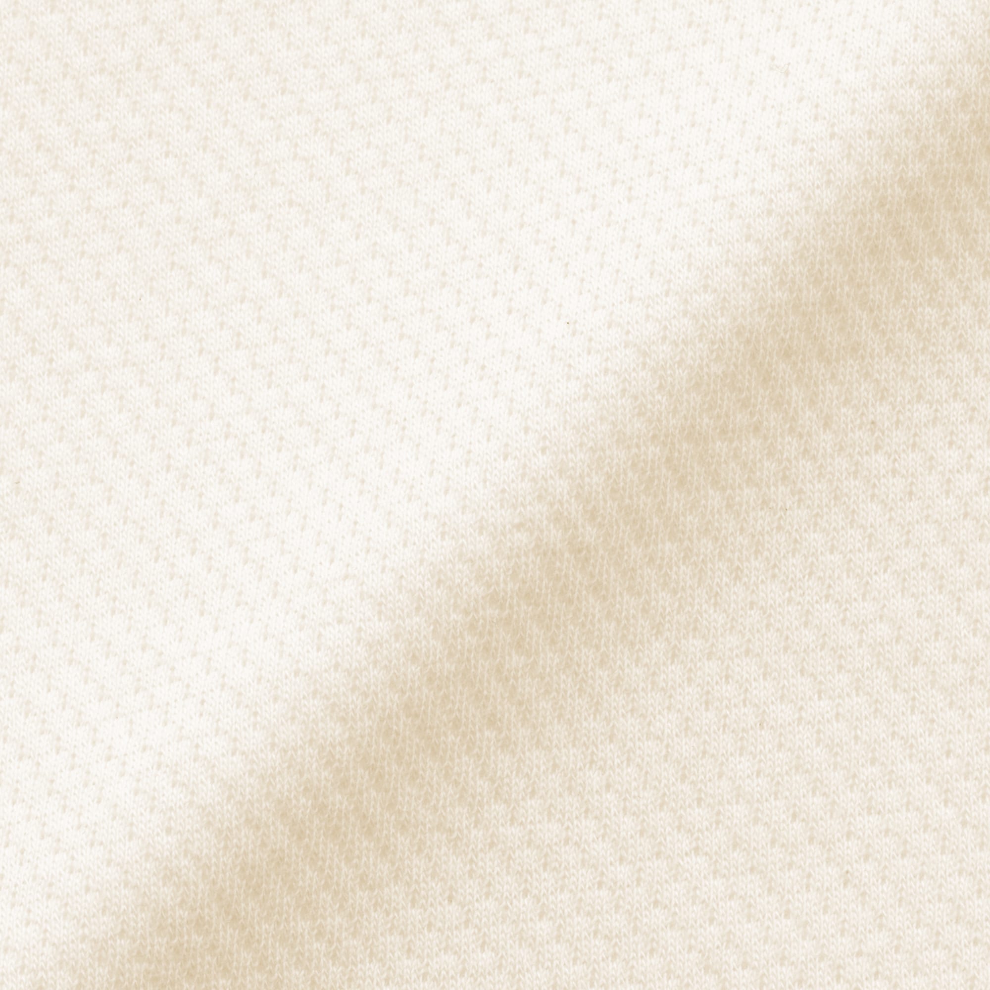 ベビー　脇に縫い目のない鹿の子編み半袖ショートオール