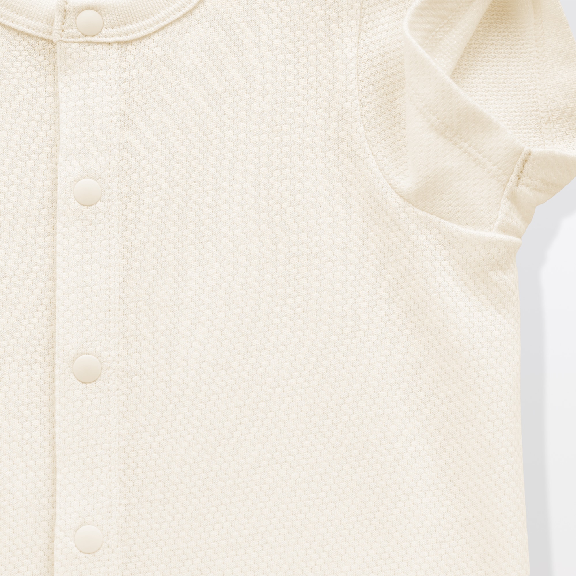 ベビー　脇に縫い目のない鹿の子編み半袖ショートオール