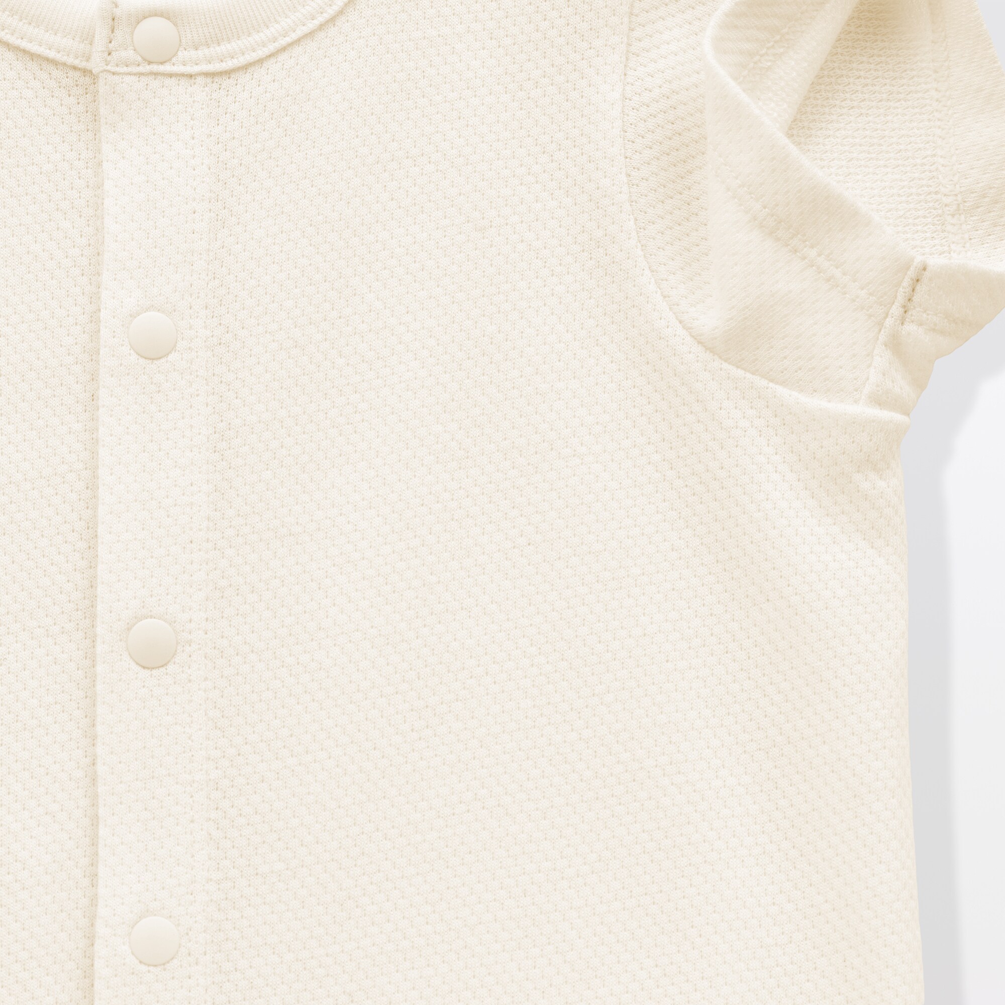 ベビー　脇に縫い目のない鹿の子編み半袖ショートオール