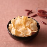 お米のスナック　ふわっと軽いチップス　ヤンニョムチキン味