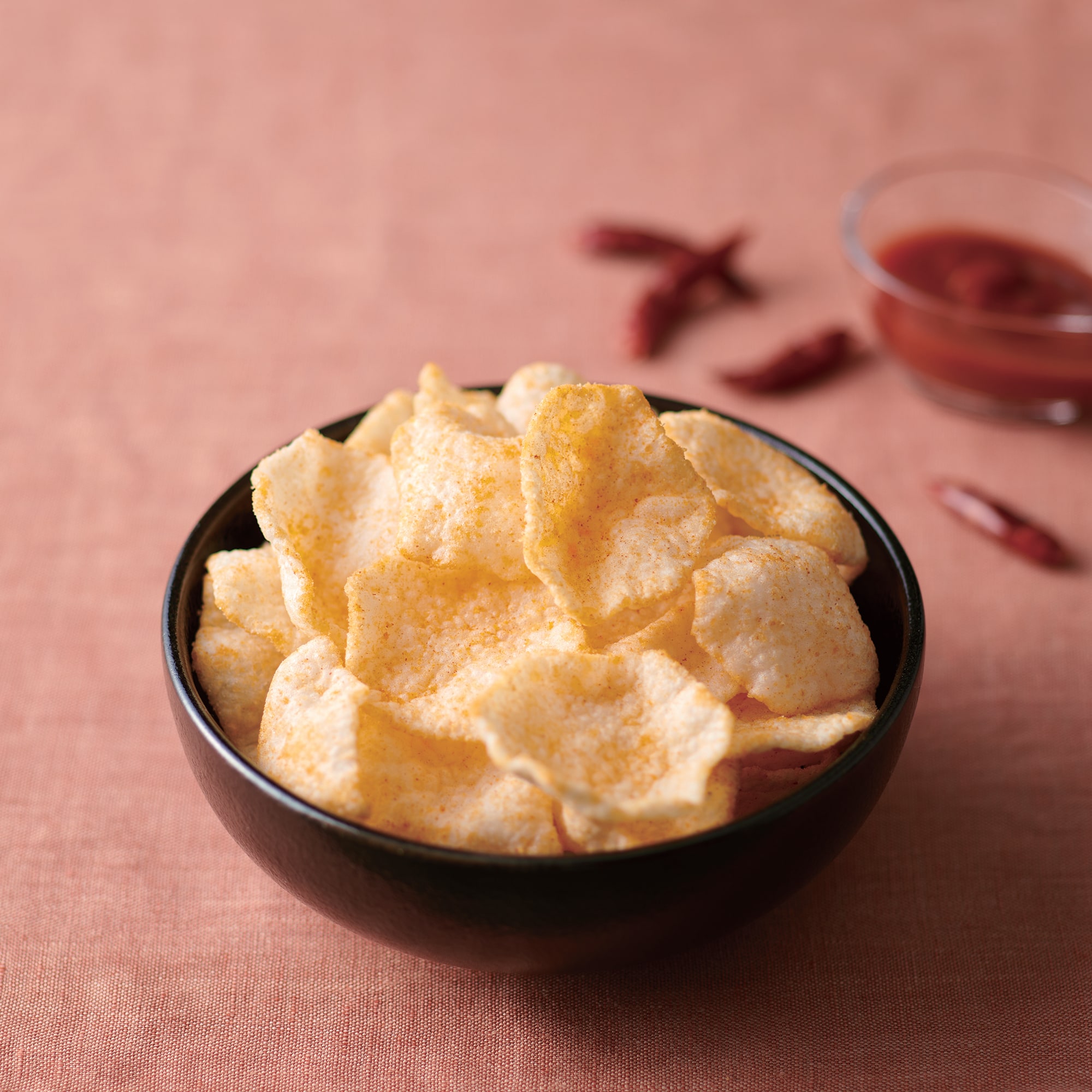 お米のスナック　ふわっと軽いチップス　ヤンニョムチキン味