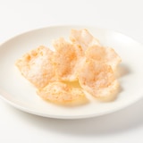 お米のスナック　ふわっと軽いチップス　ヤンニョムチキン味