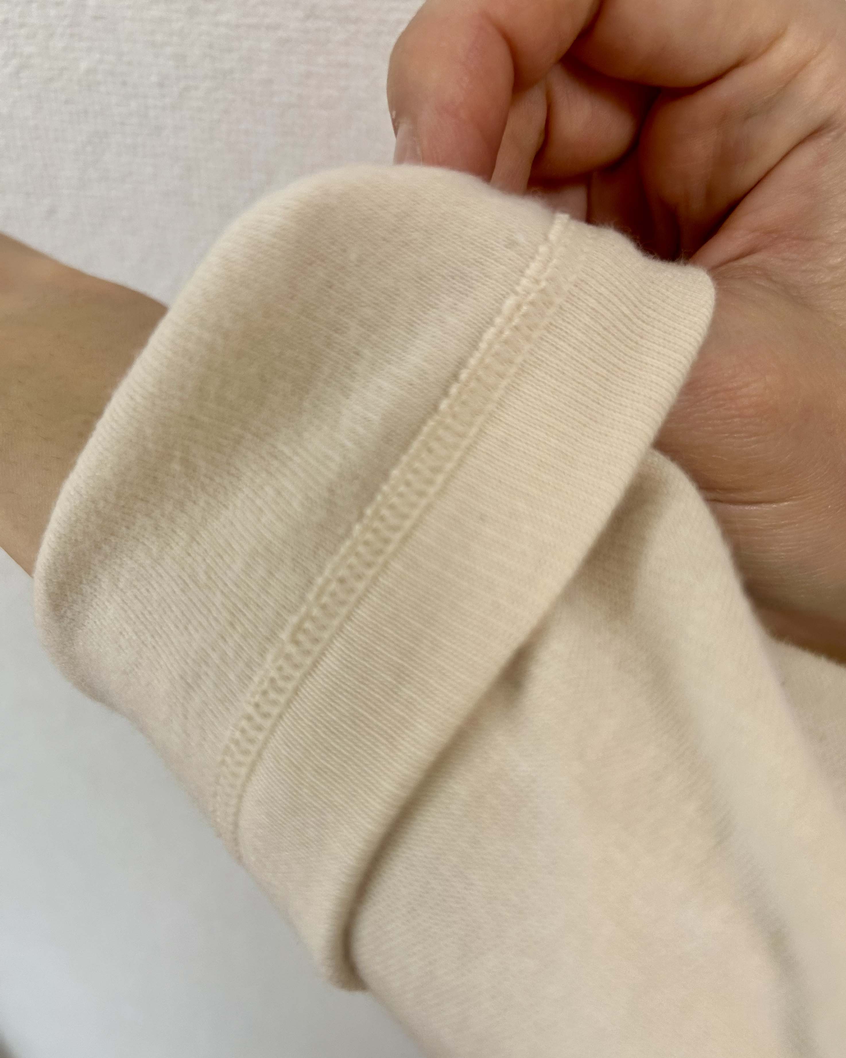 無印良品のあったか綿 ウール タートルネック長袖Tシャツ アイボリー