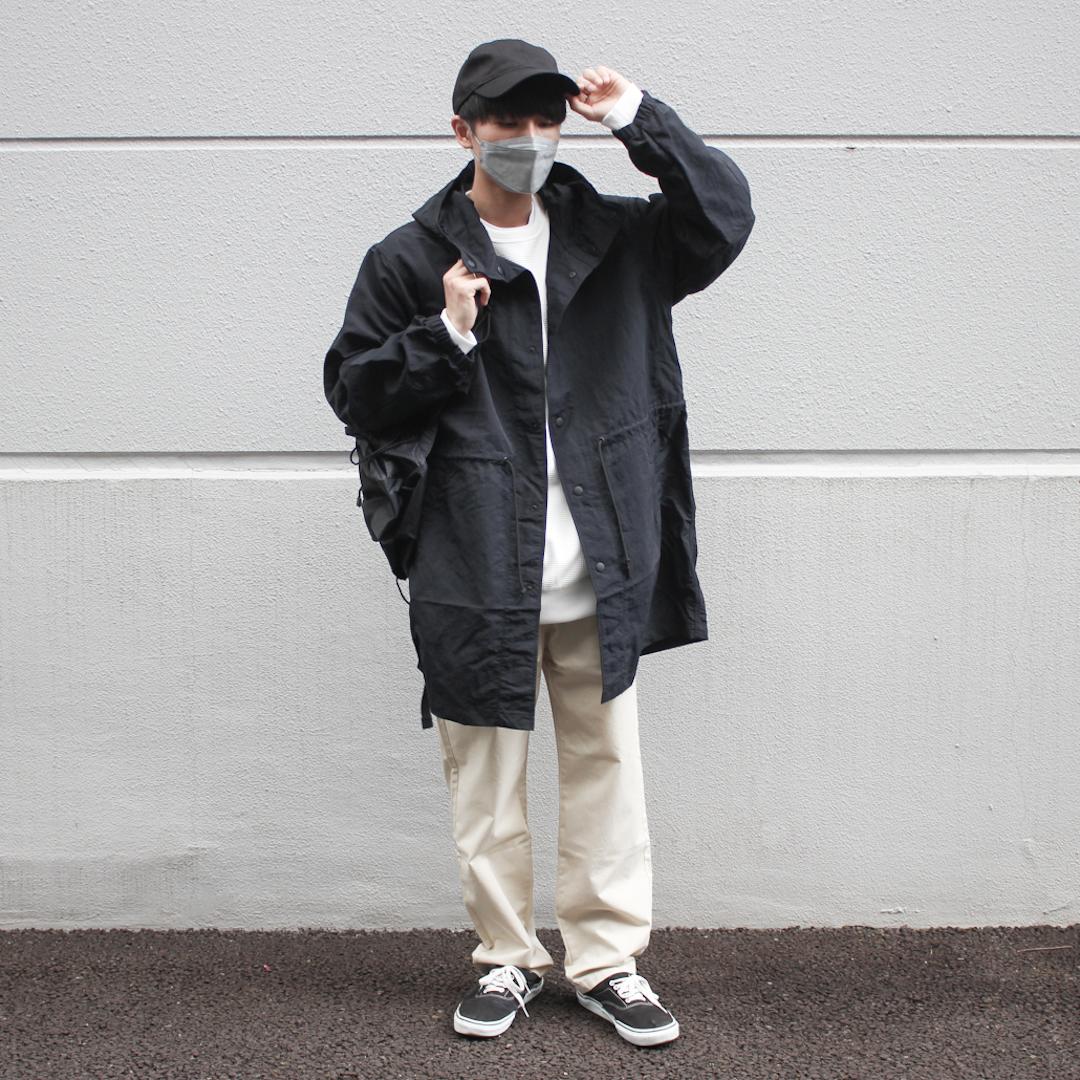 撥水コートを着た写真です