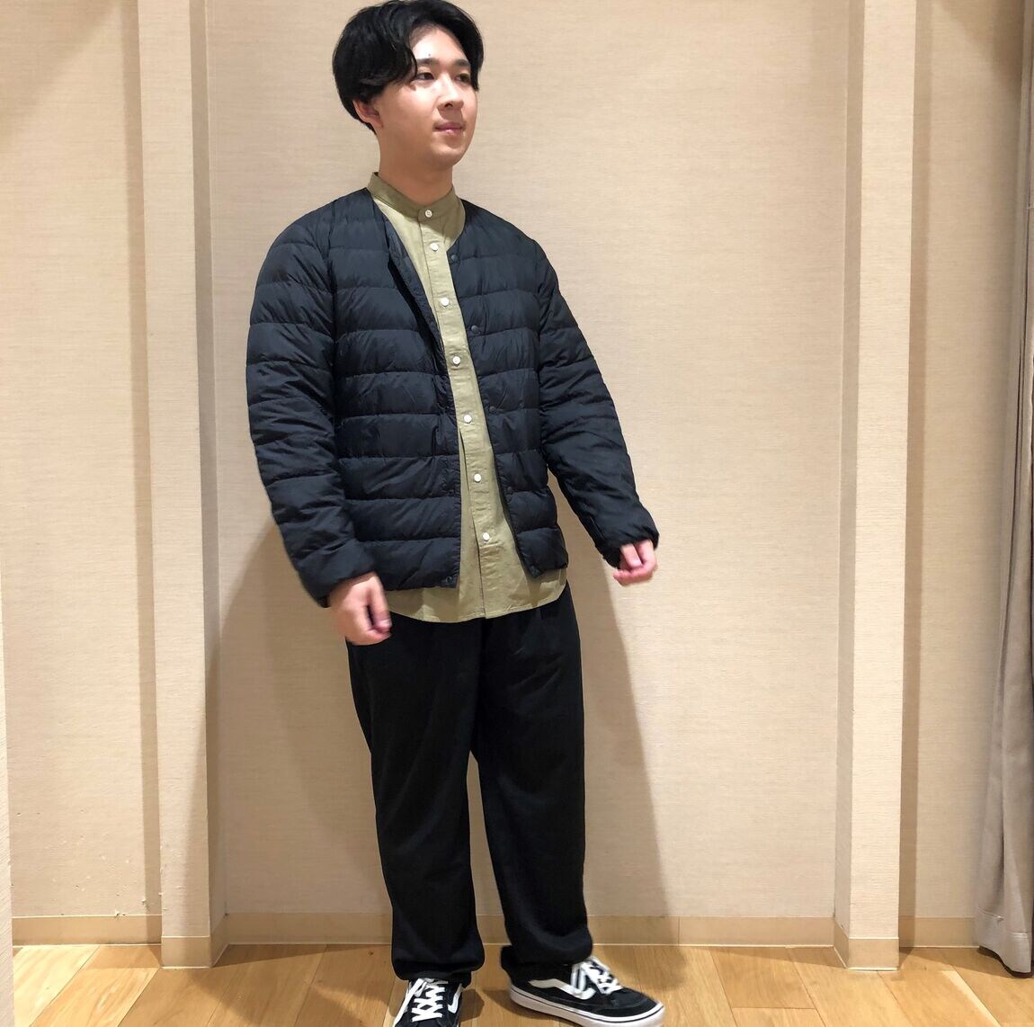 ダウンを着た男性