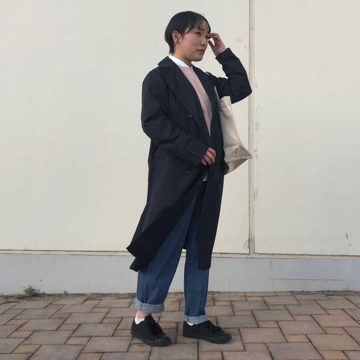 トレンチコートを着た人
