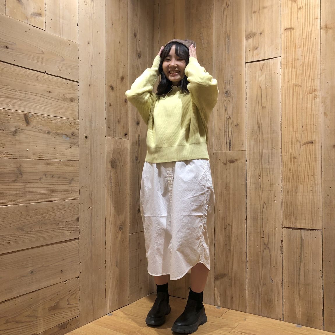 婦人のスタッフスナップの写真