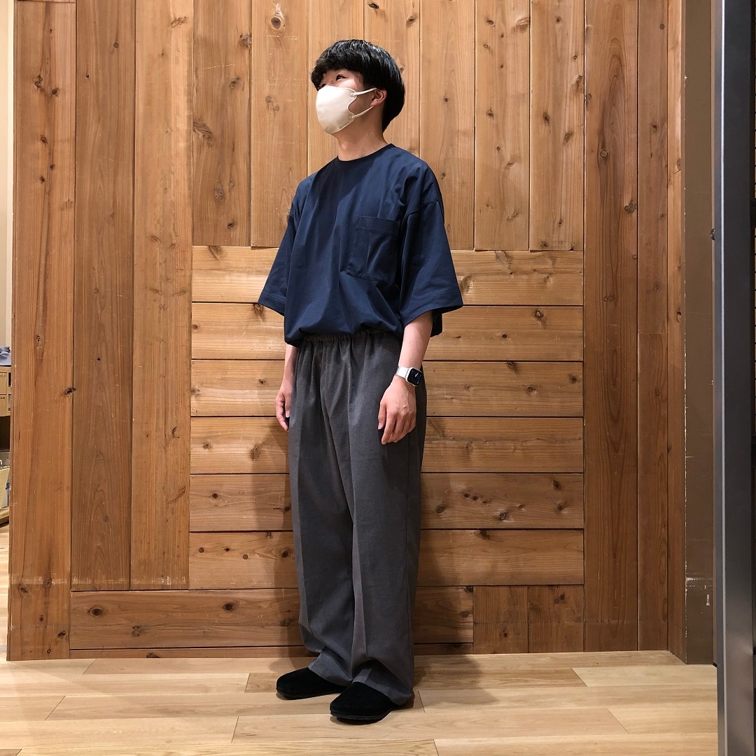 服を着ている人