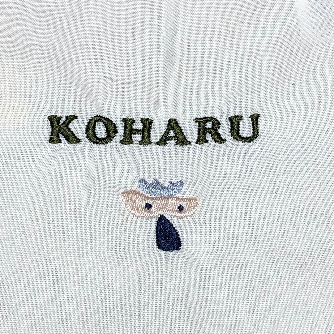 丸みの刺繍の入ったギフト巾着袋