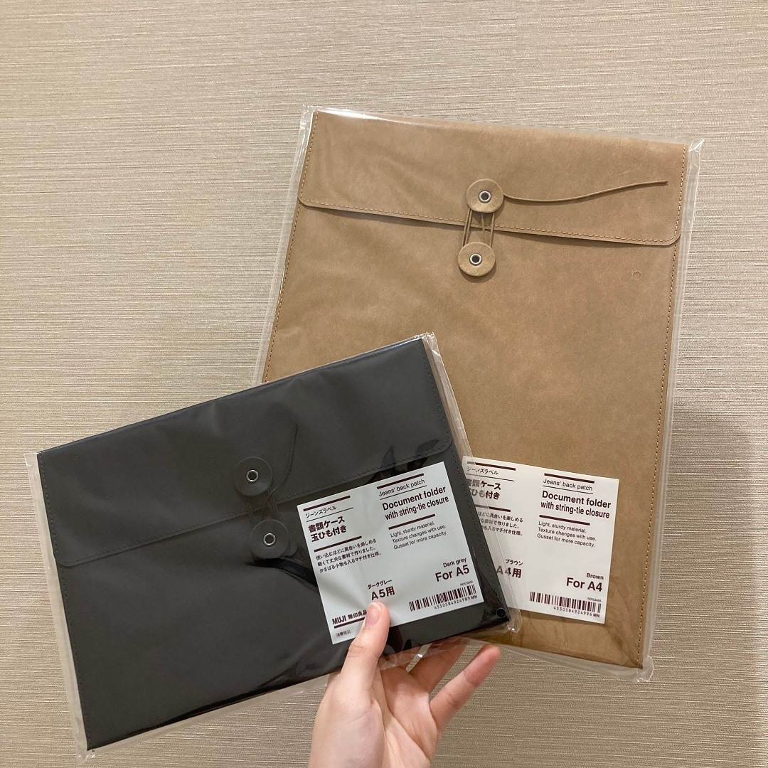 ジーンズラベル　書類ケース　玉ひも付きの写真