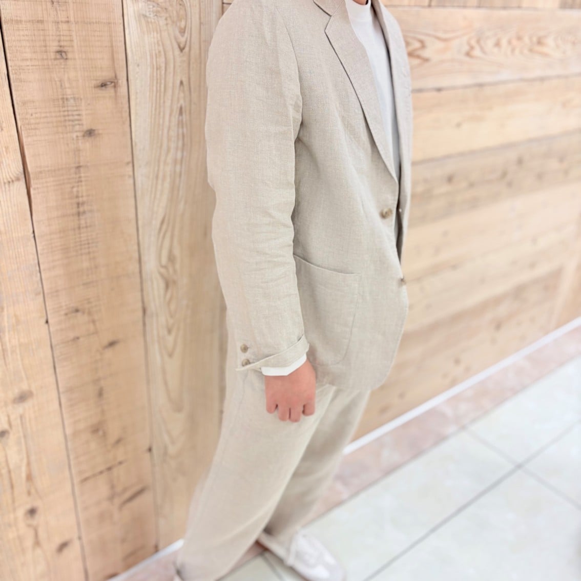 入学式にもおすすめなアイボリーコーディネートにしたスタッフの写真です。