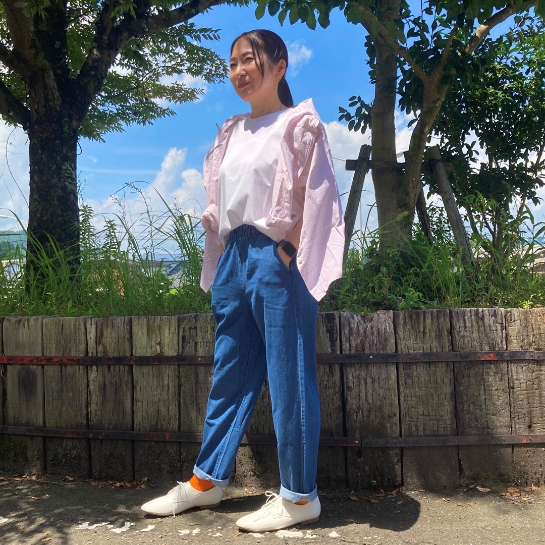 女性スタッフの写真です。