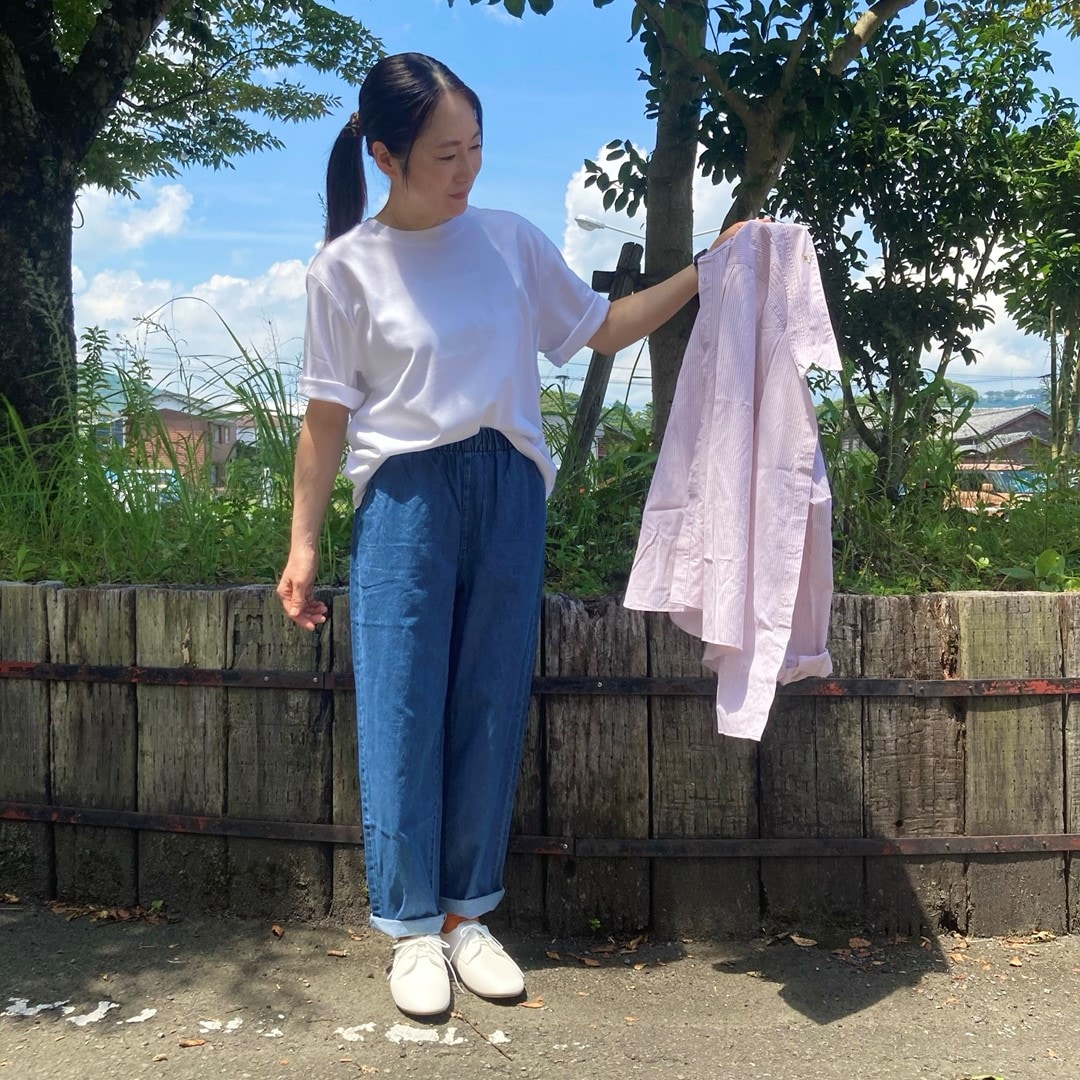 女性スタッフの写真です。