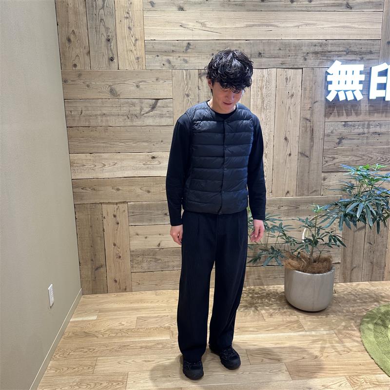 仕事着を着た男性