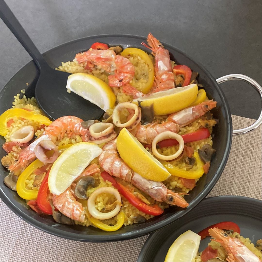 パエリア　すくってる