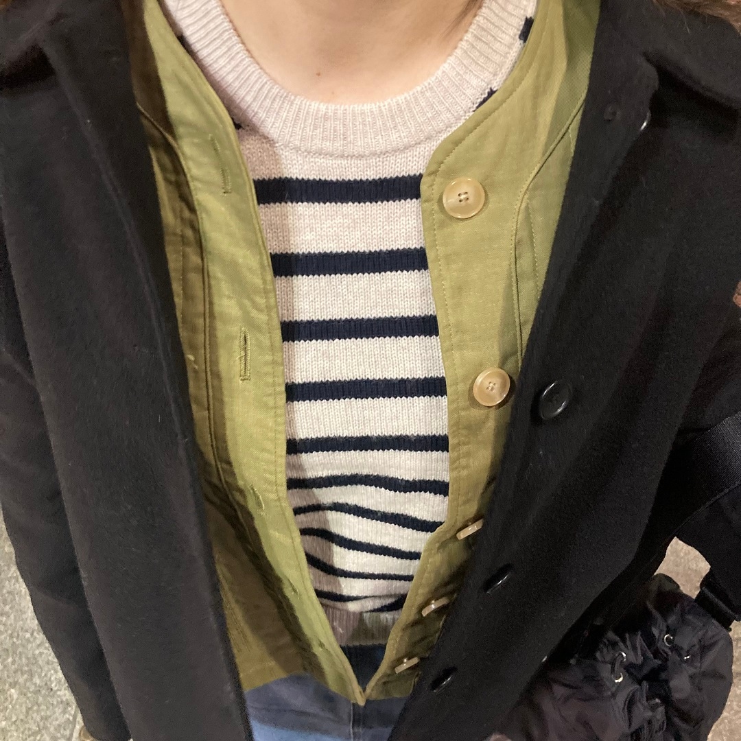 コートを着た女性の写真