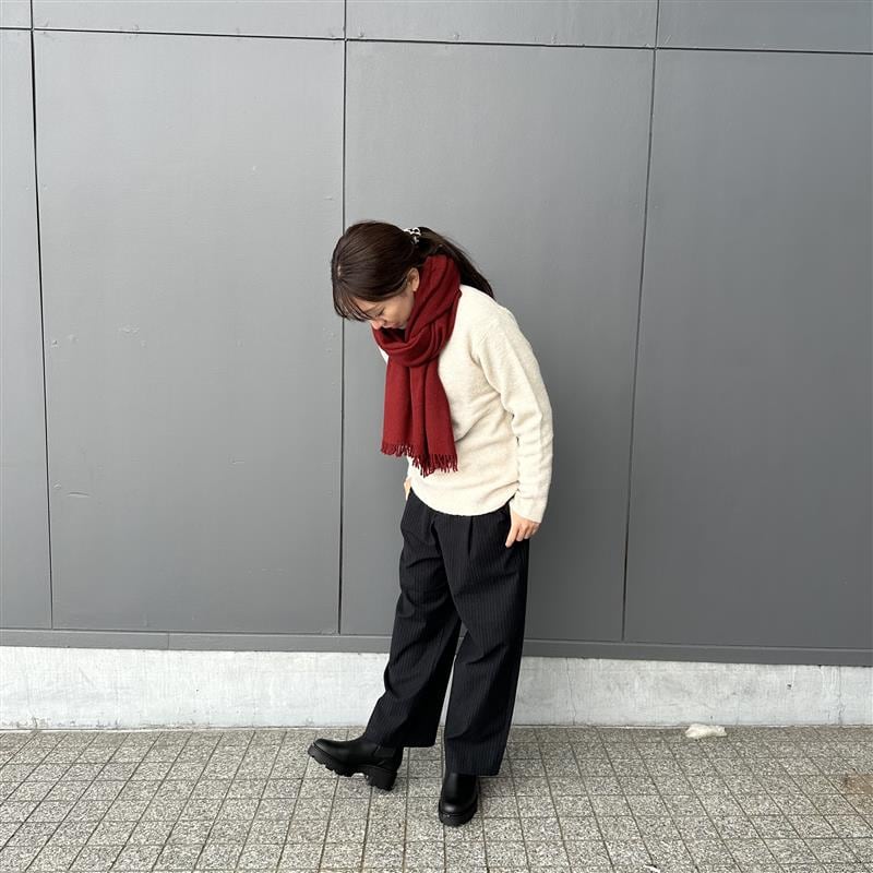 ブーツをはいた女性