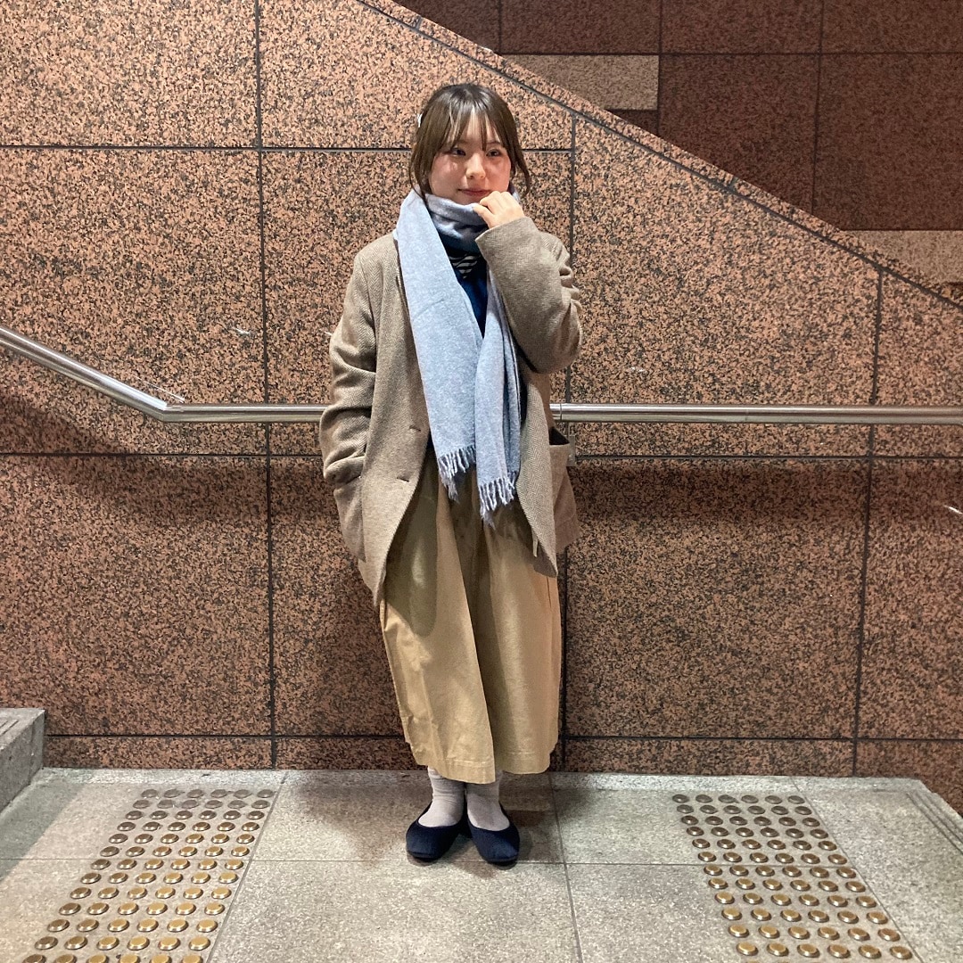 ジャケット姿の女性