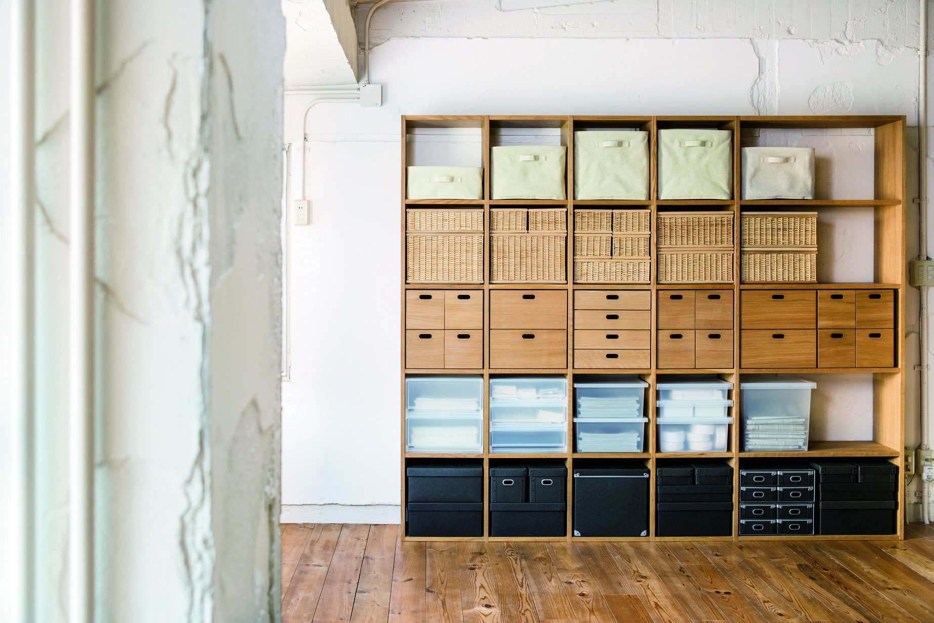 storagesolutions A series of stacking shelves filled with MUJI's storage products.